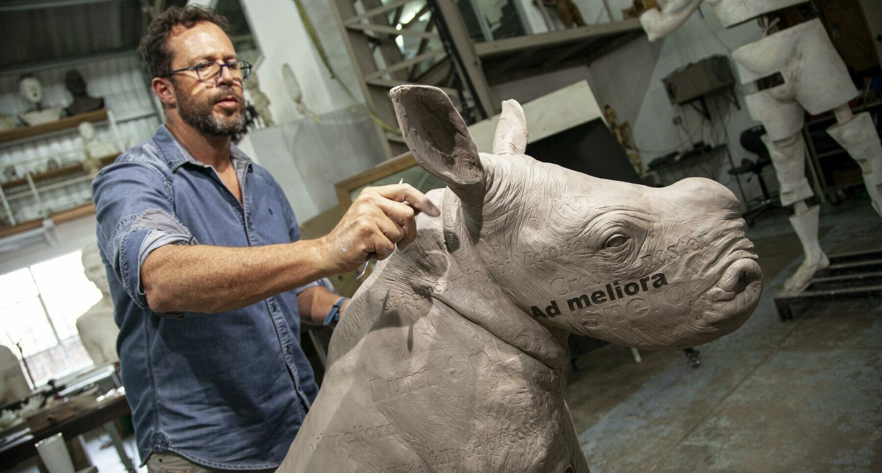 Angus Taylor in studio working on his art piece