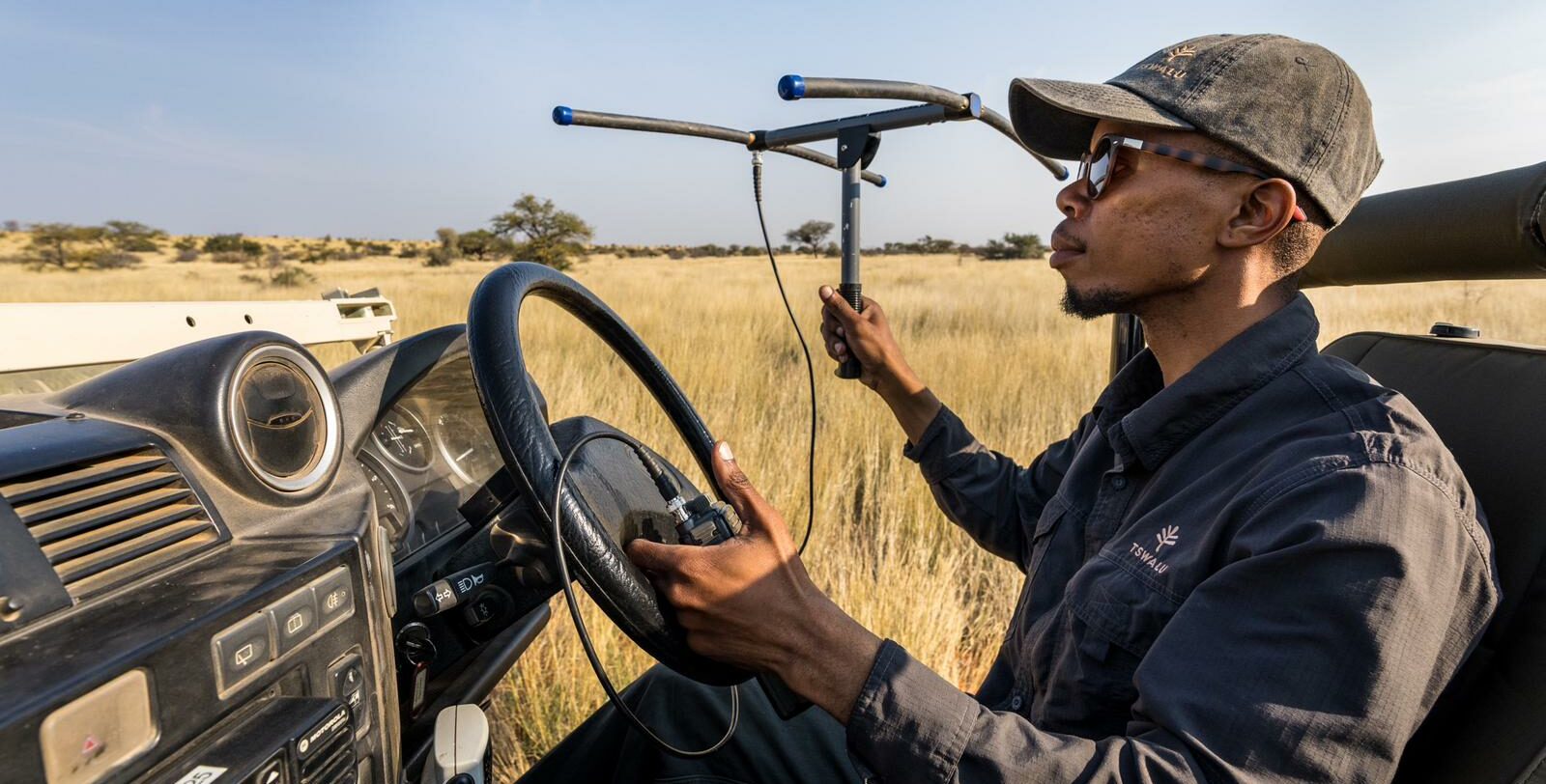 Clement Motau tracking cheetah using a telemetry set